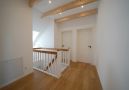 Flur im Obergeschoss mit Treppenaufgang