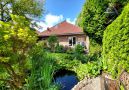 mit Gartenteich