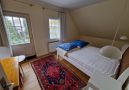 Schlafzimmer mit Dachterrassenzugang