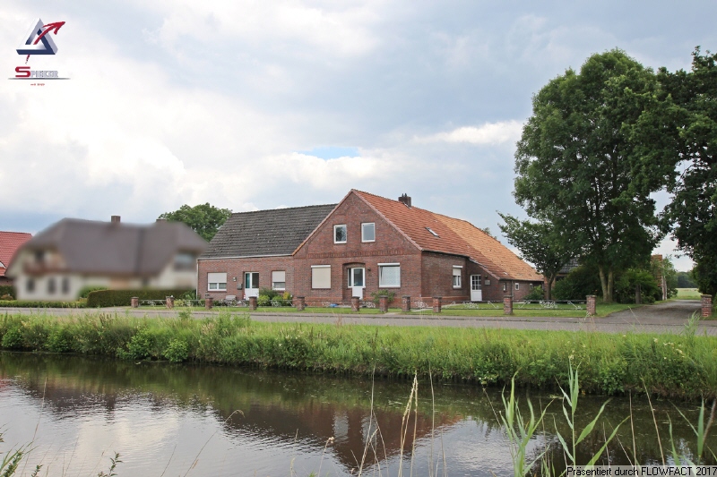 Ostfriesischer Resthof mit 2 Wohneinheiten in schöner Kanallage